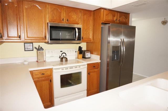 kitchen featuring appliances with stainless steel finishes