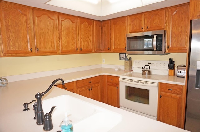 kitchen with sink and stainless steel appliances