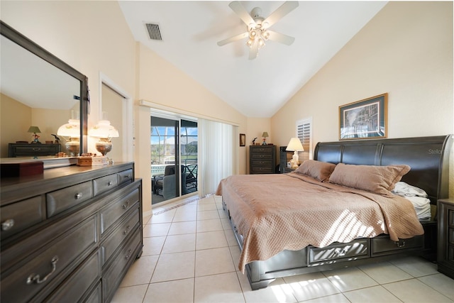 tiled bedroom featuring access to exterior, ceiling fan, and lofted ceiling