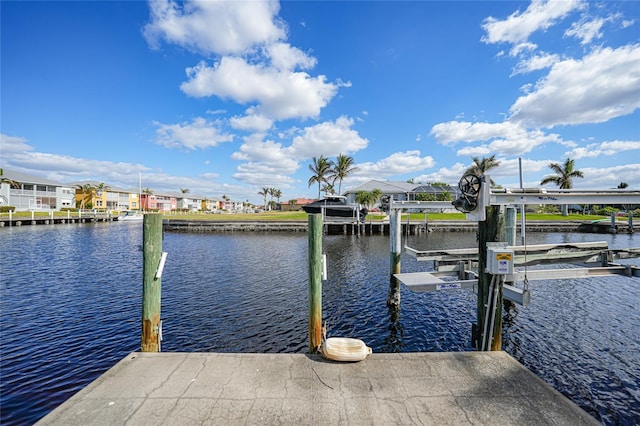 dock area featuring a water view