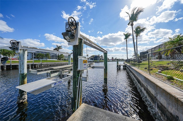 view of dock with a water view