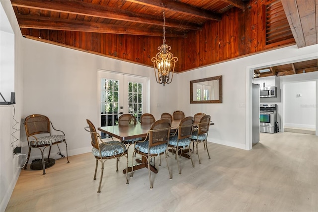 dining space featuring french doors, light hardwood / wood-style flooring, wooden ceiling, beamed ceiling, and a chandelier