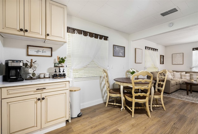 dining area with light hardwood / wood-style flooring