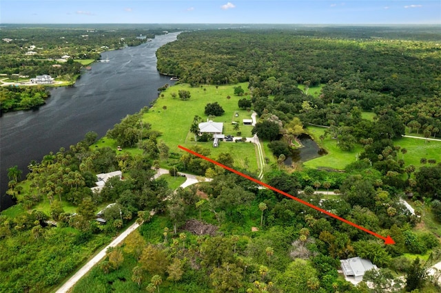 17780 Caloosa Rd, Alva, FL 33920 - aerial overview of property's location featuring a nearby body of water and a forest