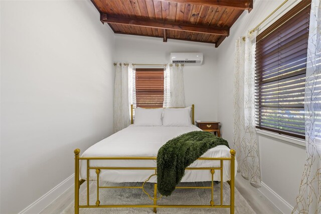 bedroom with wood-type flooring, vaulted ceiling with beams, a wall unit AC, and wood ceiling