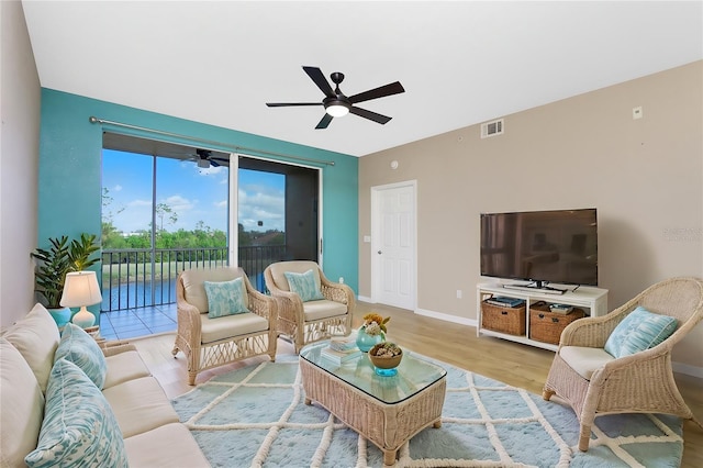 living room with light hardwood / wood-style floors