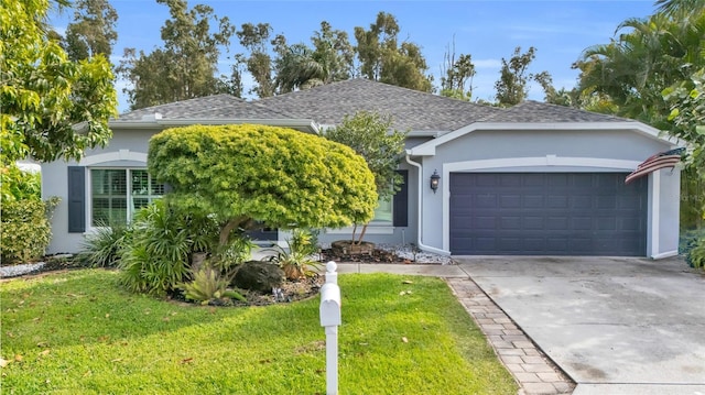 ranch-style home with a front lawn and a garage