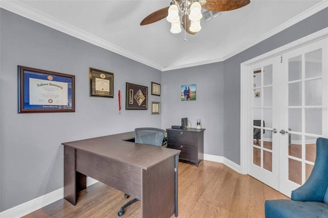 office area with ceiling fan, light wood-type flooring, crown molding, and french doors