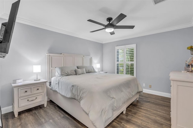 bedroom featuring ceiling fan, crown molding, and dark hardwood / wood-style floors