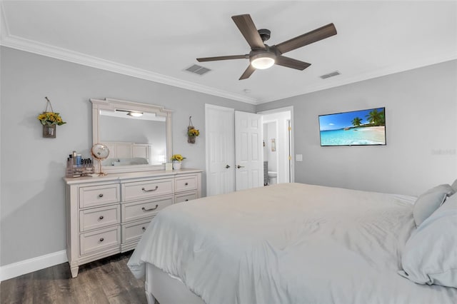 bedroom with dark hardwood / wood-style flooring, ceiling fan, and crown molding