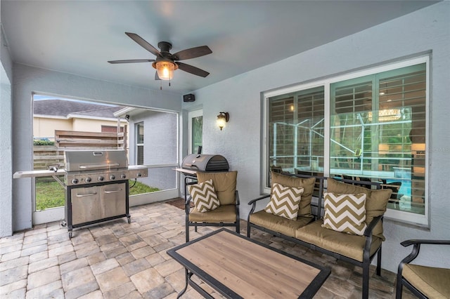 view of patio / terrace with outdoor lounge area, ceiling fan, and a grill