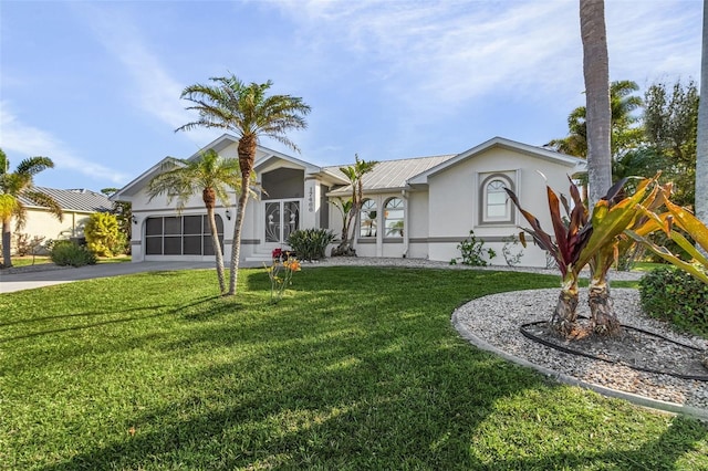 ranch-style home featuring a garage and a front lawn