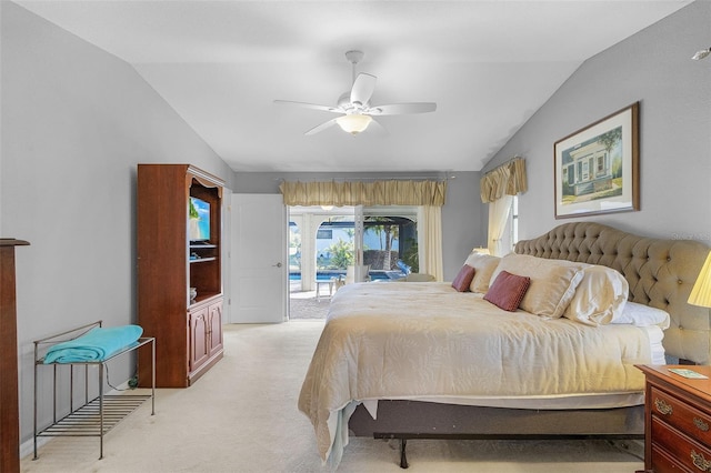 bedroom featuring access to outside, ceiling fan, light carpet, and vaulted ceiling