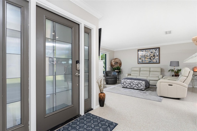 interior space featuring ornamental molding and carpet floors