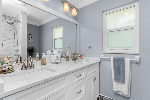 bathroom featuring vanity and ornamental molding