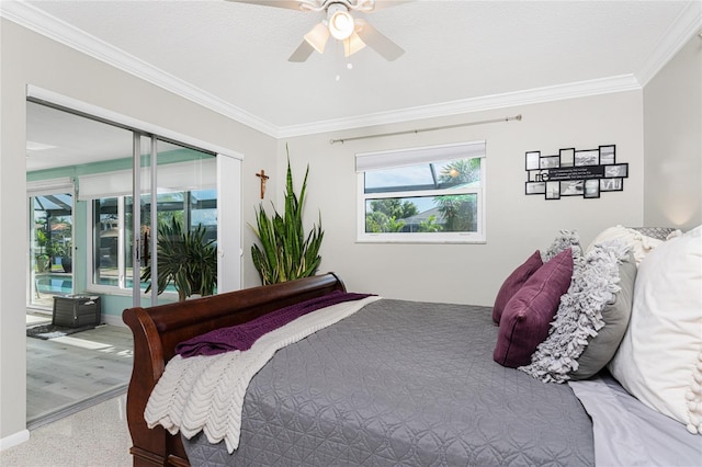 bedroom featuring ceiling fan, access to exterior, ornamental molding, a textured ceiling, and wood-type flooring