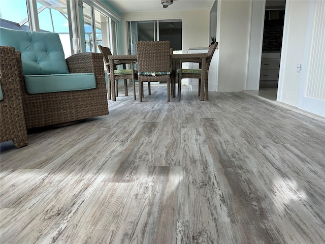 dining space with light wood-type flooring