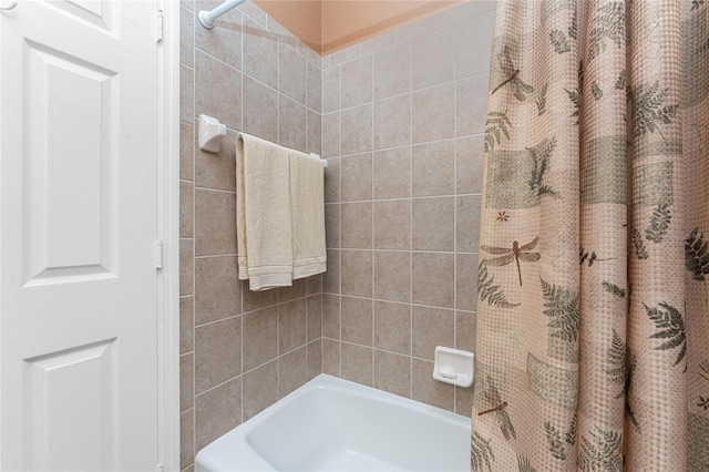 bathroom featuring shower / bathtub combination with curtain