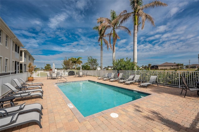 view of swimming pool featuring a patio