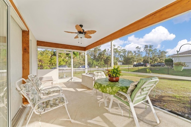 sunroom / solarium with ceiling fan and a wealth of natural light