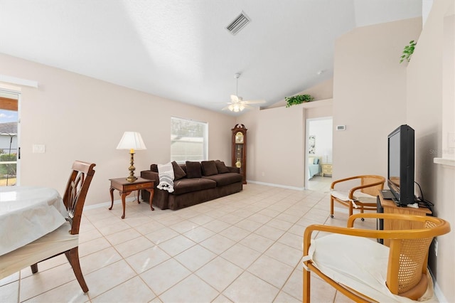 living room featuring light tile patterned floors, ceiling fan, and lofted ceiling