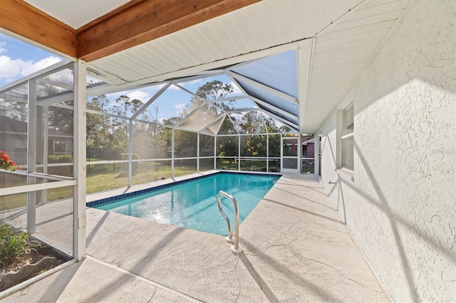 view of pool featuring a lanai and a patio area