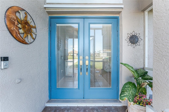 doorway to property with french doors