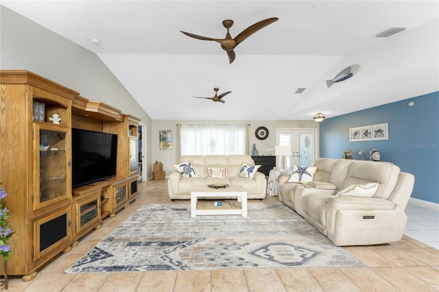 living room with french doors, vaulted ceiling, and ceiling fan