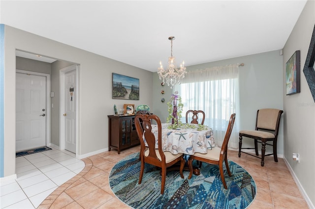 tiled dining area with a notable chandelier