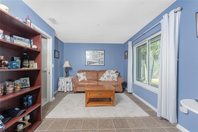 living room featuring tile patterned floors