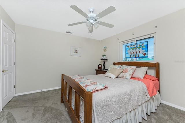 carpeted bedroom featuring ceiling fan