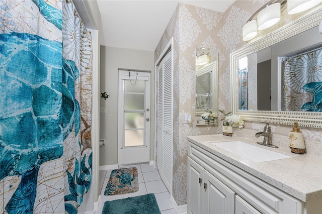 bathroom with vanity and tile patterned floors