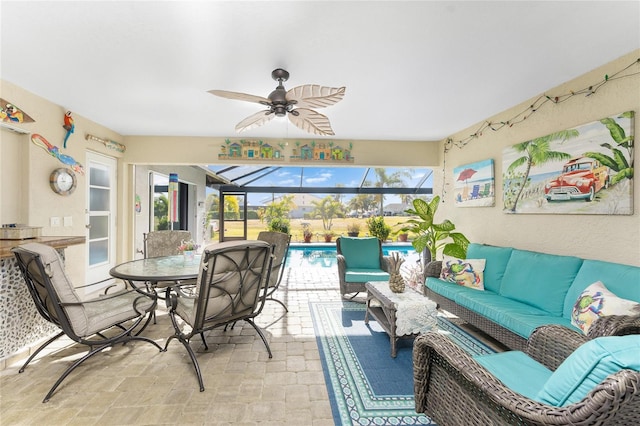 sunroom / solarium with ceiling fan