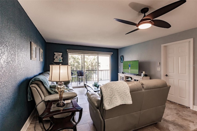 living room featuring ceiling fan