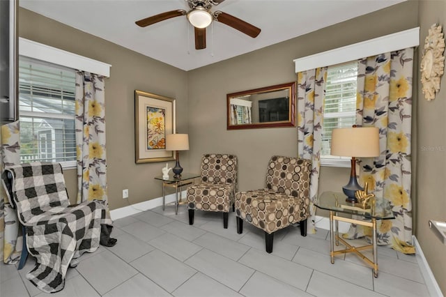 living area with light tile patterned flooring