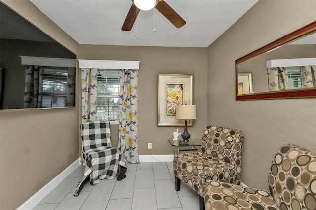 living area with light tile patterned floors