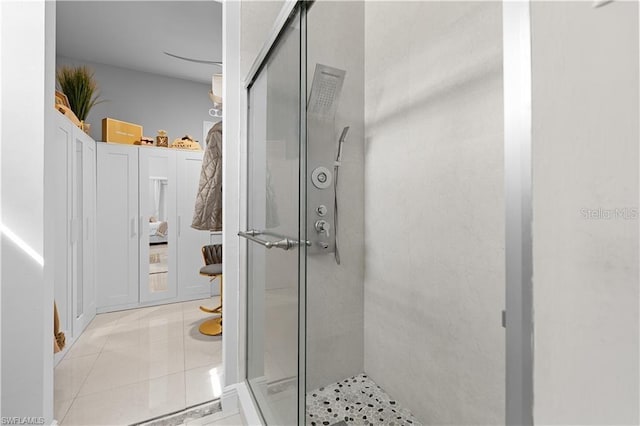 bathroom featuring tile patterned floors and an enclosed shower