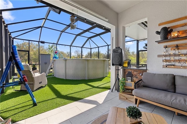 view of patio / terrace with a lanai, an outdoor hangout area, and a swimming pool