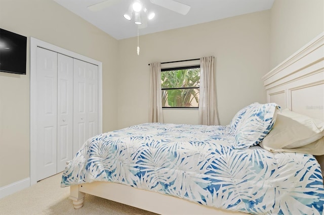 bedroom featuring carpet flooring, a closet, and ceiling fan