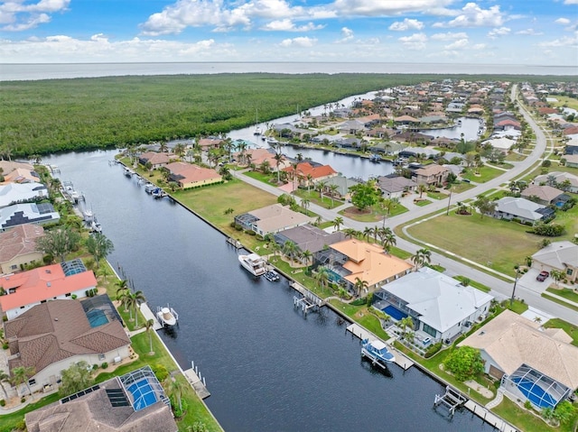 drone / aerial view with a water view