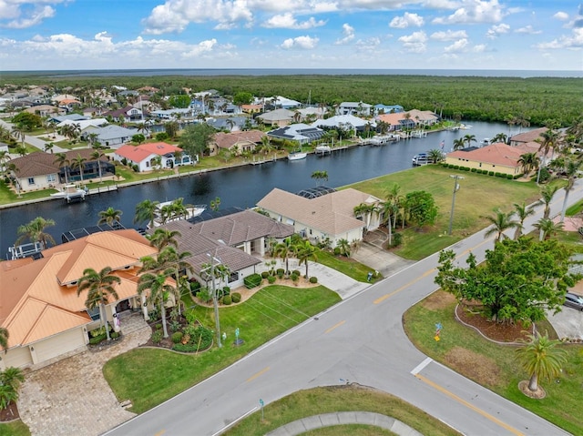 drone / aerial view with a water view