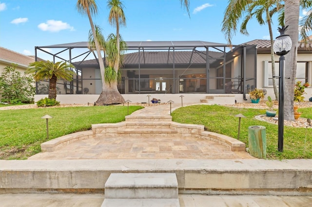 exterior space featuring a lanai, a tile roof, a lawn, and stucco siding