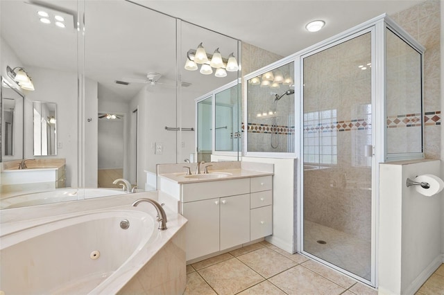 bathroom featuring tile patterned floors, ceiling fan, vanity, and independent shower and bath