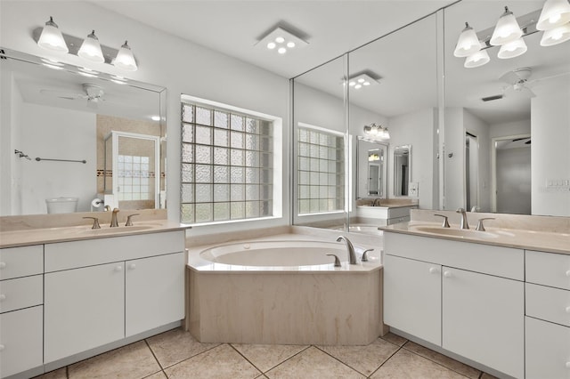 full bathroom with shower with separate bathtub, vanity, tile patterned floors, and ceiling fan