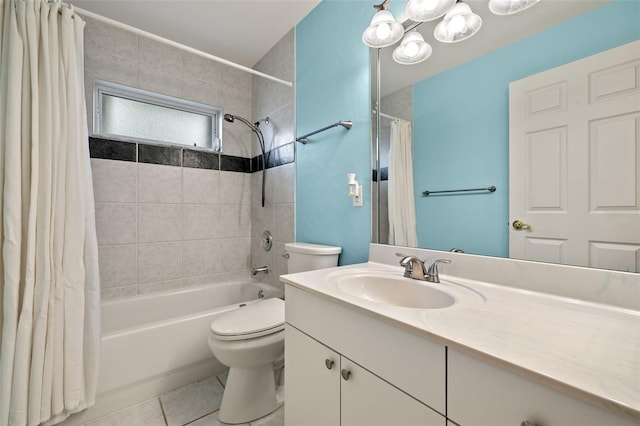 full bathroom featuring tile patterned flooring, shower / tub combo, vanity, and toilet