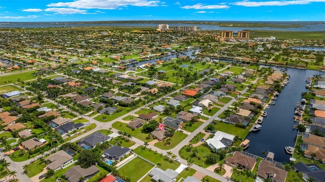 bird's eye view with a water view