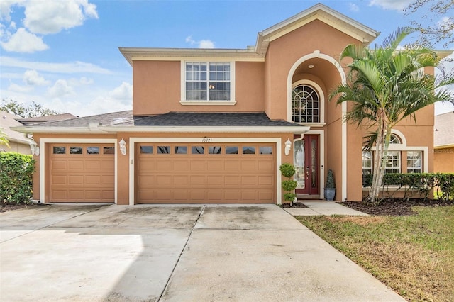 view of front of property featuring a garage