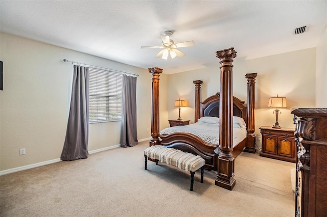 bedroom featuring ceiling fan and light carpet