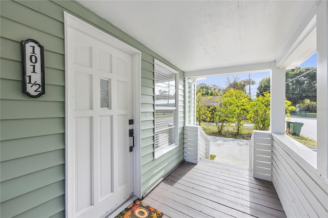 wooden terrace with covered porch