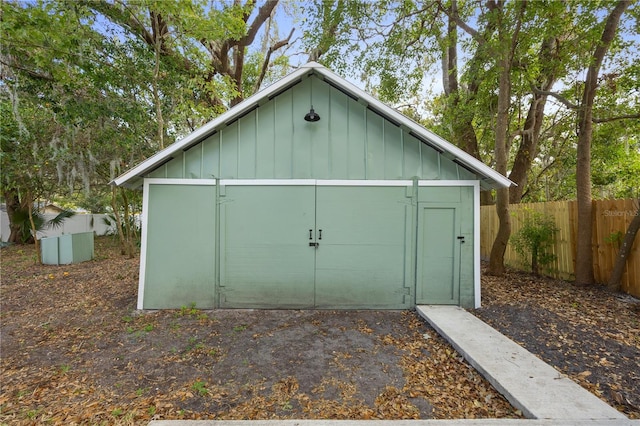 view of shed with fence